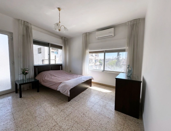 Charming Weibdeh Apartment with Panoramic Citadel & Amman Views