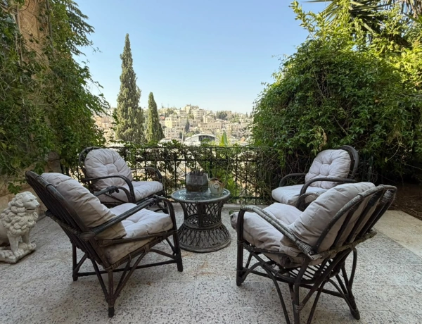 Charming 2-Bedroom Garden Apartment in Jabal Amman