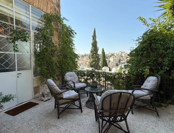Charming 2-Bedroom Garden Apartment in Jabal Amman
