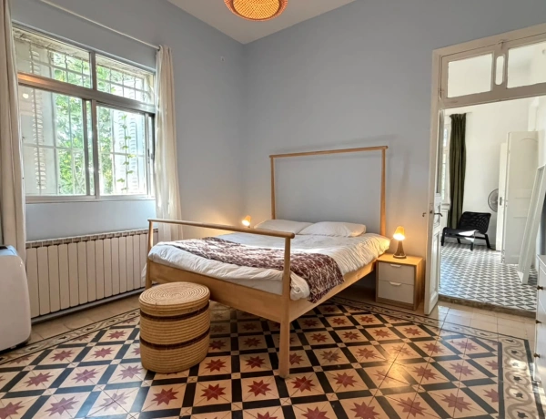 Charming 2-Bedroom Garden Apartment in Jabal Amman