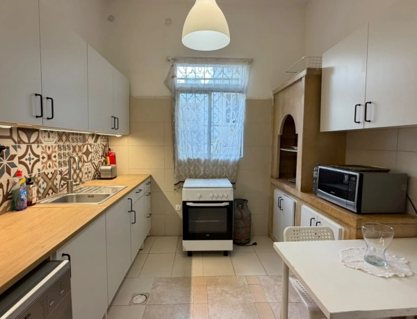 Charming 2-Bedroom Garden Apartment in Jabal Amman