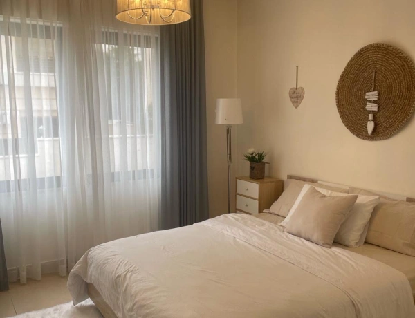 Ground Floor 2-Bedroom Apartment with Terrace & Private Garage in Swefieh, Amman