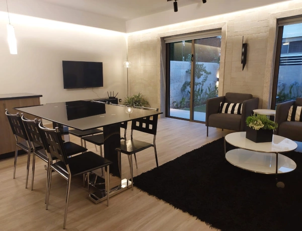 1-Bedroom Apartment for Rent in Abdoun | Private Garden | Near Blue Fig