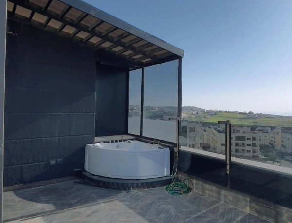 Luxury 4-Bedroom Duplex Roof Apartment for rent in Deir Ghbar, Amman