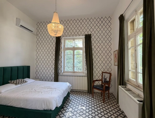 Charming 2-Bedroom Garden Apartment in Jabal Amman