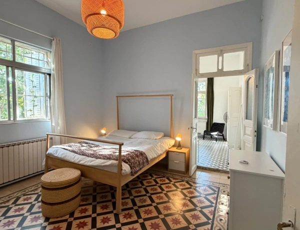 Charming 2-Bedroom Garden Apartment in Jabal Amman