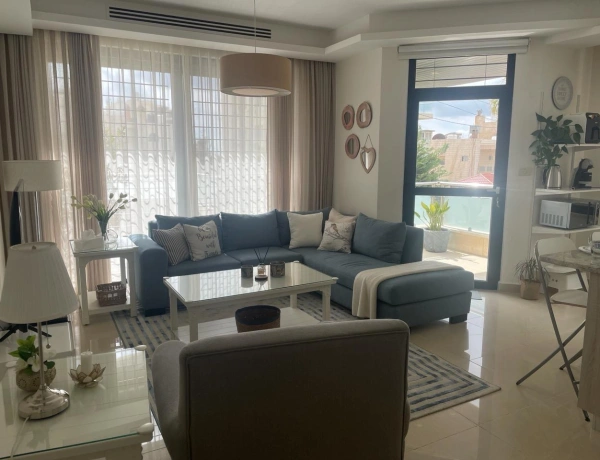 Ground Floor 2-Bedroom Apartment with Terrace & Private Garage in Swefieh, Amman