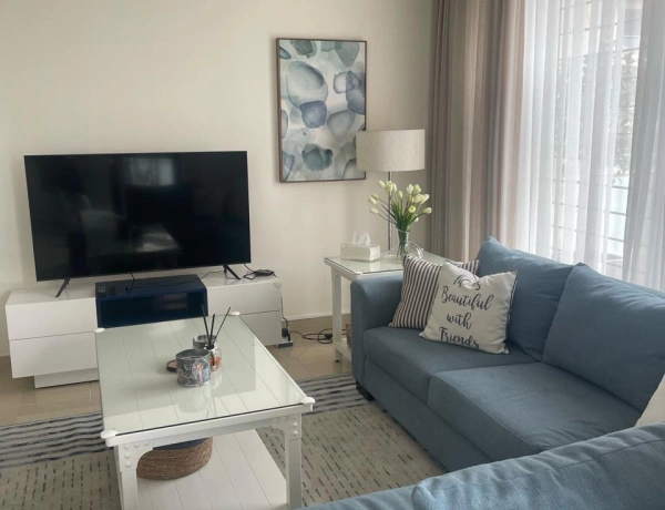 Ground Floor 2-Bedroom Apartment with Terrace & Private Garage in Swefieh, Amman
