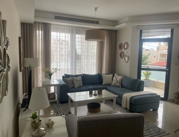 Ground Floor 2-Bedroom Apartment with Terrace & Private Garage in Swefieh, Amman