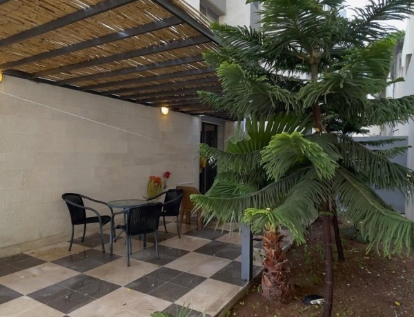 Two-Bedroom Apartment with Private Garden for Rent in Jabal Amman – 4th Circle