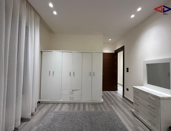 Spacious 2-Bedroom Apartment for Rent in Deir Ghbar – Ground Floor with Terrace, Parking & Elevator